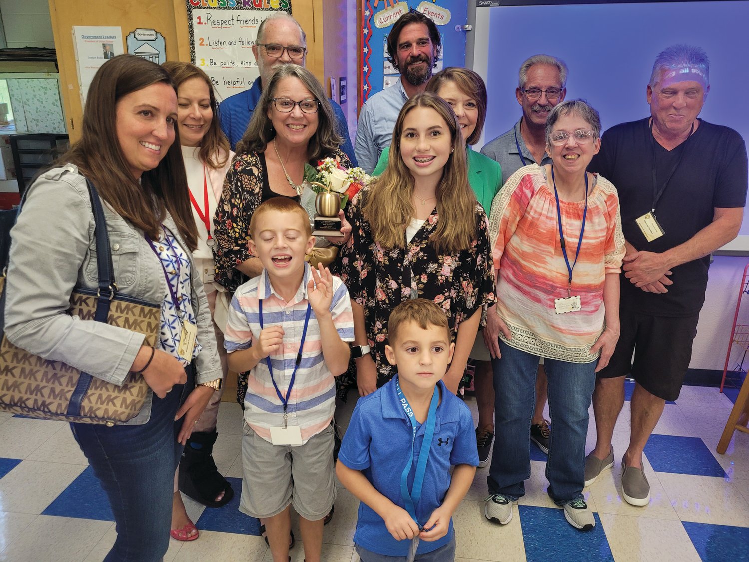 FAMILY & FRIENDS: Ferri Middle School Teacher Joan Wright’s family and friends helped to fill her classroom last Thursday after she was awarded a “Golden Apple.”